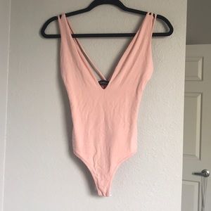 Pink bodysuit